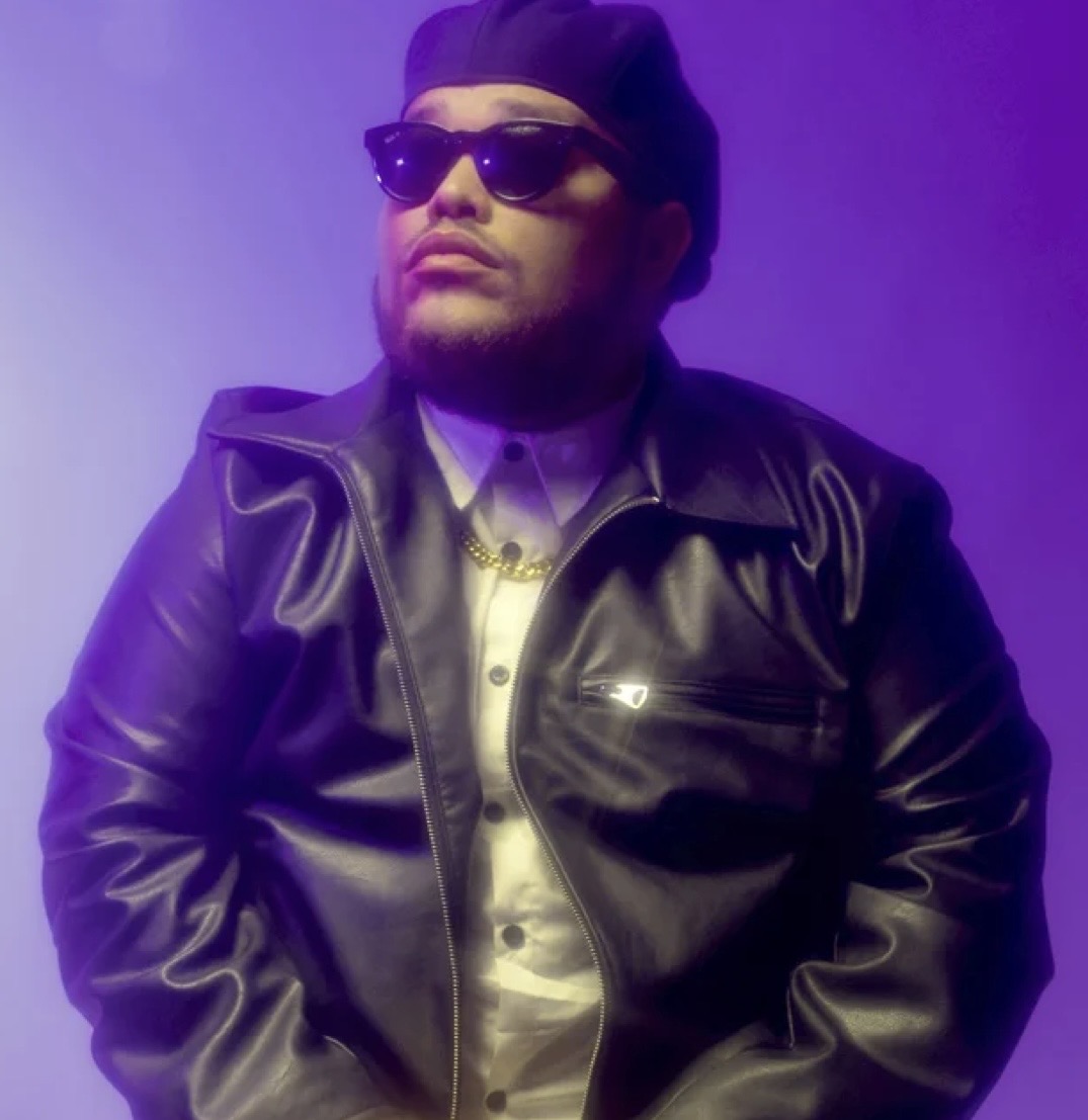 Paul Bill Jr. in purple stage light
